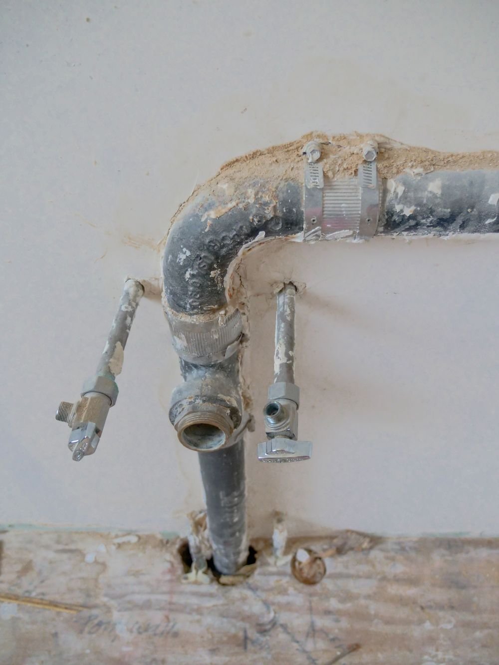 Exposed copper plumbing pipes and fittings